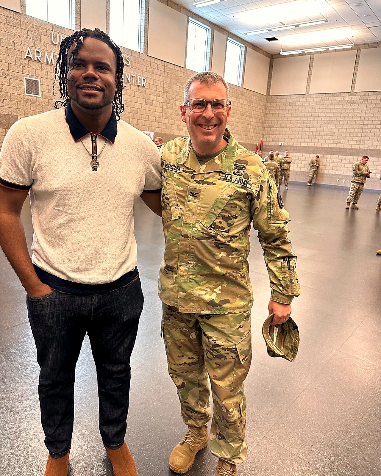 Founder D'Vonta Richard meeting with U.S. Army Colonel Minaschek at a U.S. Army Reserve Center — active-duty partnership discussion.